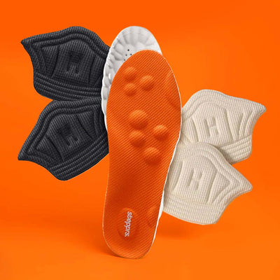 An orange insole and fabric heel cushions floating against an orange backdrop.