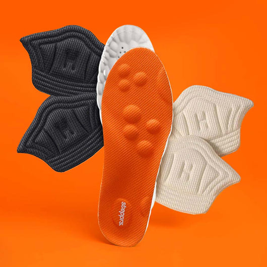 An orange insole and fabric heel cushions floating against an orange backdrop.
