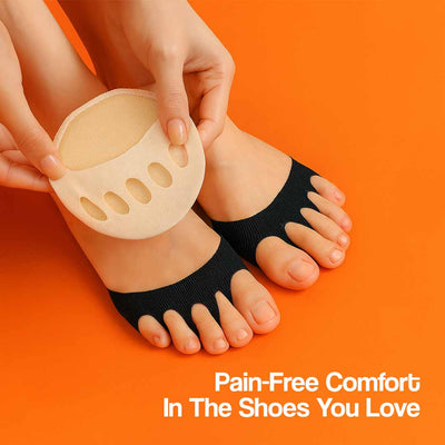 A person's hands holding beige ToeCushionPads over feet wearing black toe covers.